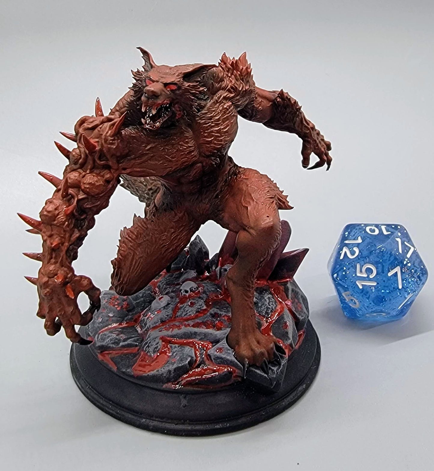 Bloodclaw Abominable Werewolf large sized resin miniature with spiked arm and feral snarl on a rocky base, perfect for TTRPG boss encounters.