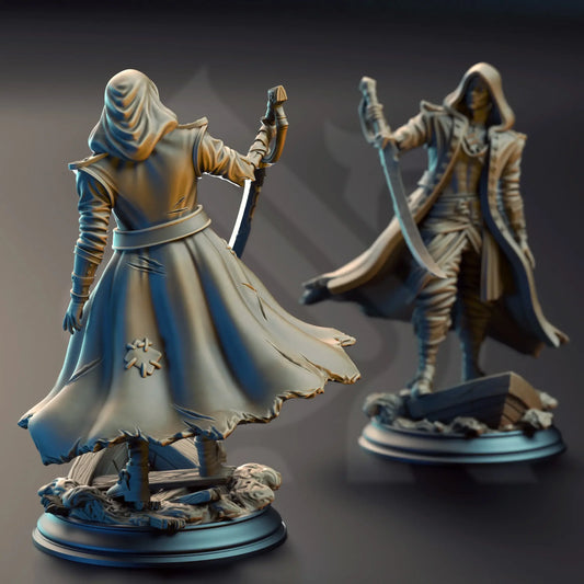 Two fantasy figurines in hooded cloaks with weapons on a dark background