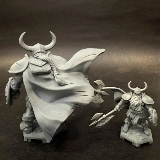 Another image showing the rear side of the model next to the smaller variant in gray resin