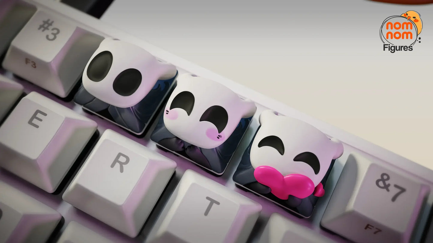 hollow knight keycap close up playful face