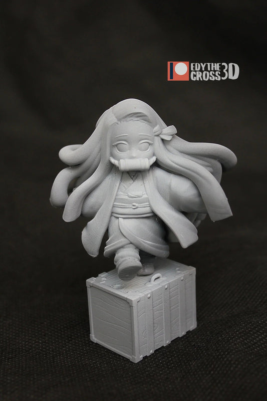 3D printed Nezuko Kamado figure from Demon Slayer standing on wooden crate, unpainted gray resin