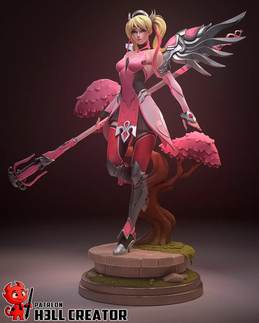 Full view of Mercy Overwatch fan art statue on tree base