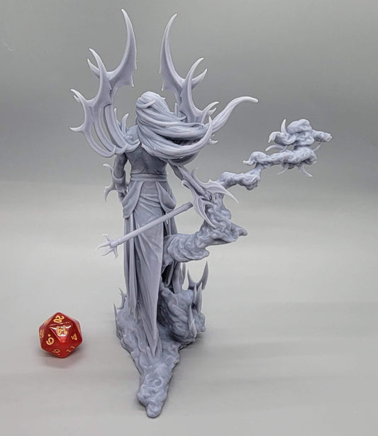 Supreme Cloud Giant Assembled – rear view with gaps filled next to a D20, printed in Chitu Systems Conjure Rigid Resin - Gray