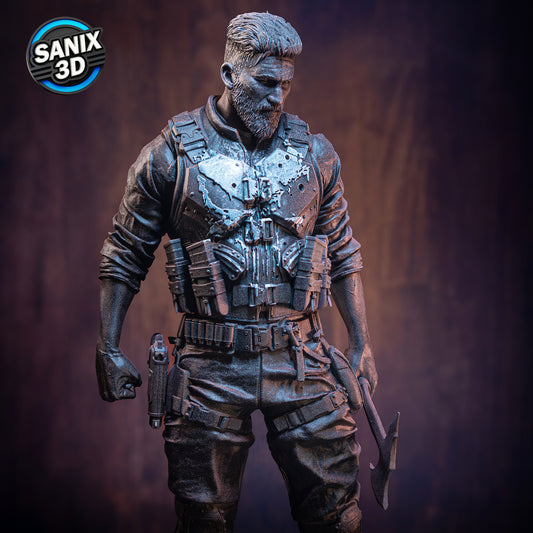 Resin fan art statue of The Punisher with axe and rifle on skull base – 3D printed collectible by D&K Custom Prints.