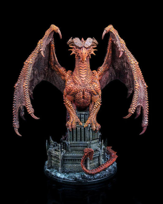 Full painted render front view of the Arnya Ember Wing Dragon miniature showcasing orange and red draconic scales perched on a ruined tower.