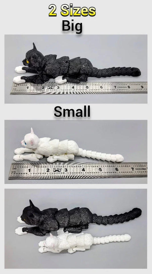 Size comparison of 3D printed Flexi Cat Toys – black cat in large size and white cat in small size shown next to rulers for scale.