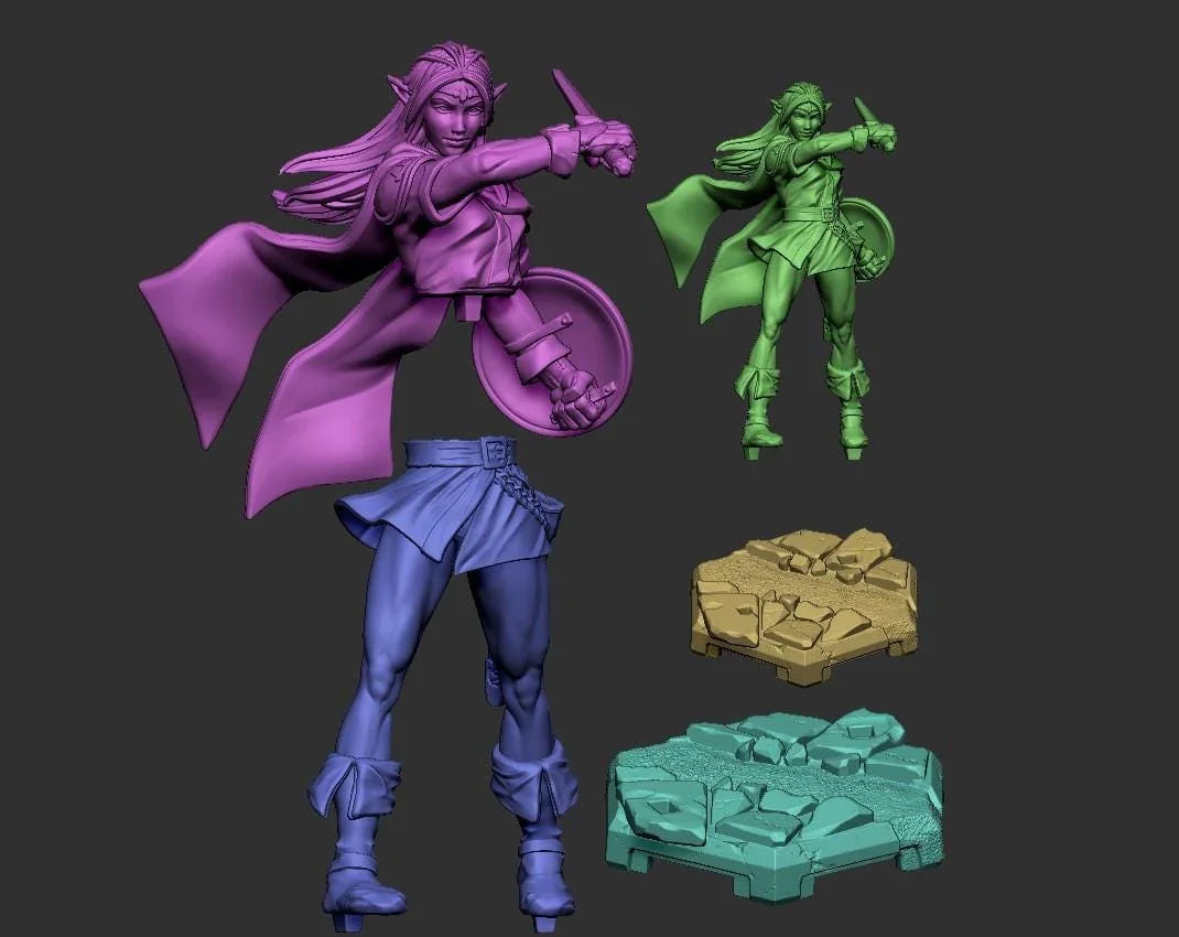 Lucia the Elf – 3D printed fantasy miniature with sword, shield, and flowing cape. Showing separated pieces for assembly
