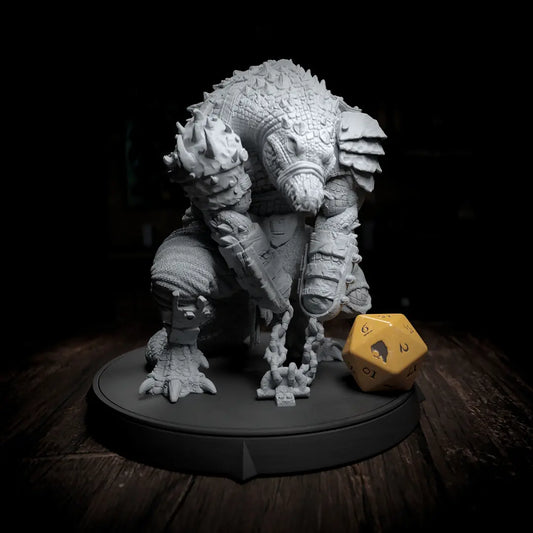 Front view of Kothar Skran Arak Lizard villain miniature in a chained crouching pose.