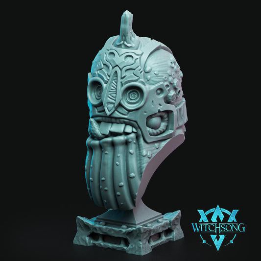 Treachery of Whales 100mm display bust showing its mask-like face, coral growths, and aquatic giant features.