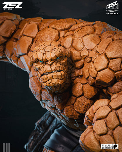 Color close-up of The Thing's alternate no beard head sculpt, featuring realistic orange rocky textures and blue eyes, from the ZEZ Studios 1:6 scale statue.
