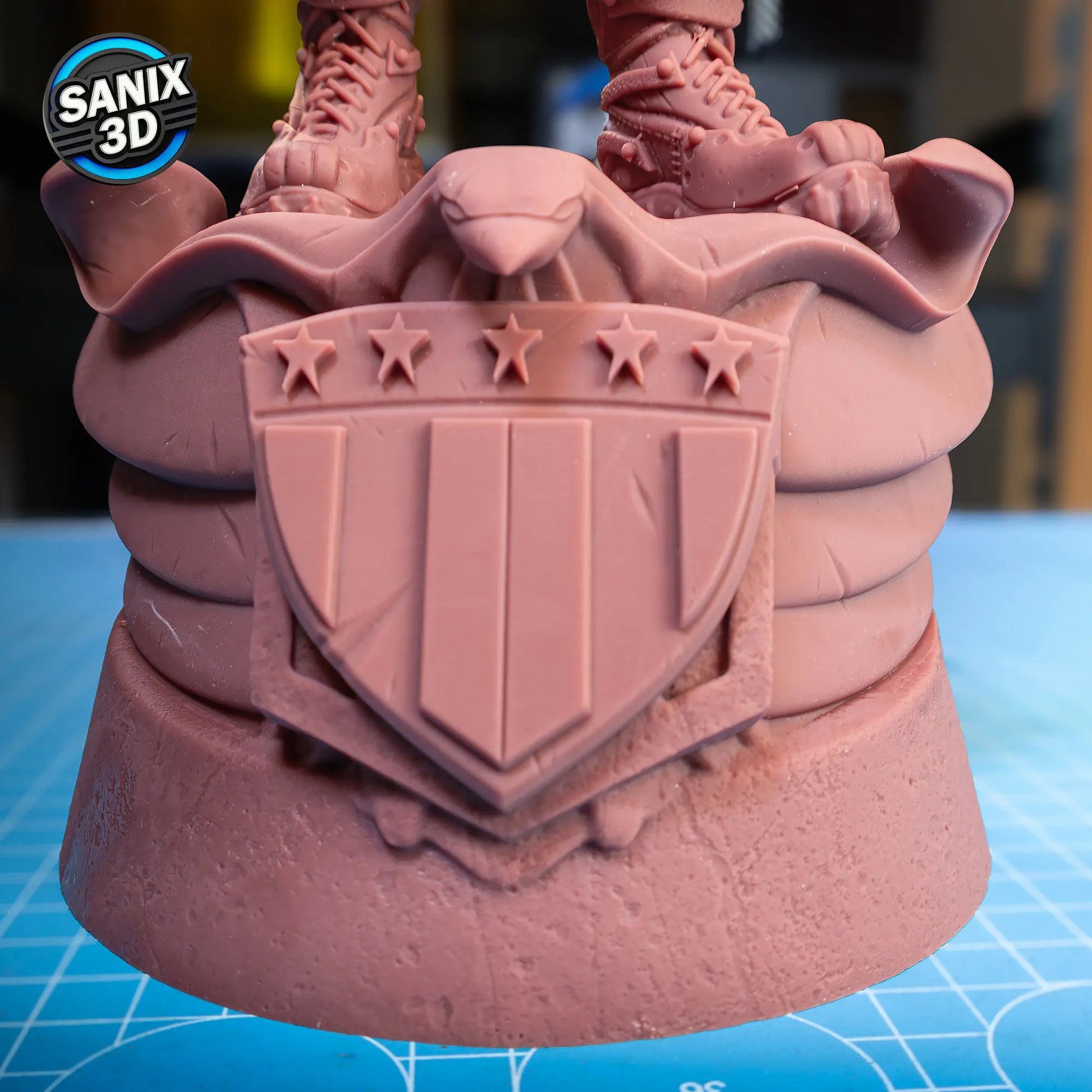 Detailed eagle and shield base of Judge Dredd statue