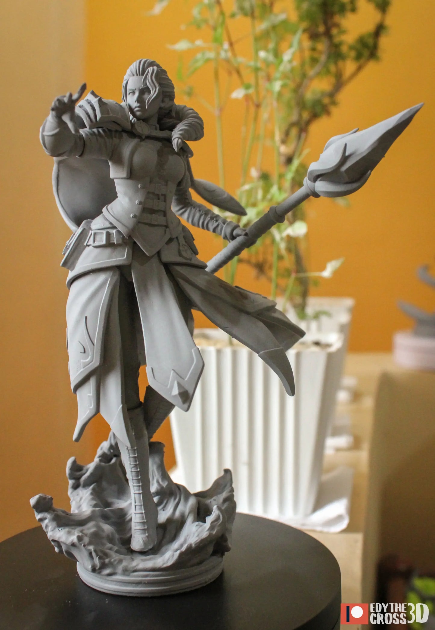 ont angle of full figure with staff forward