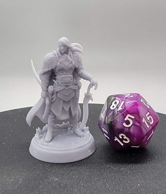 Levin Elven Ranger resin miniature standing beside a D20 die, featuring detailed armor, bow, and flowing cloak. Available in 32mm and 75mm scales.