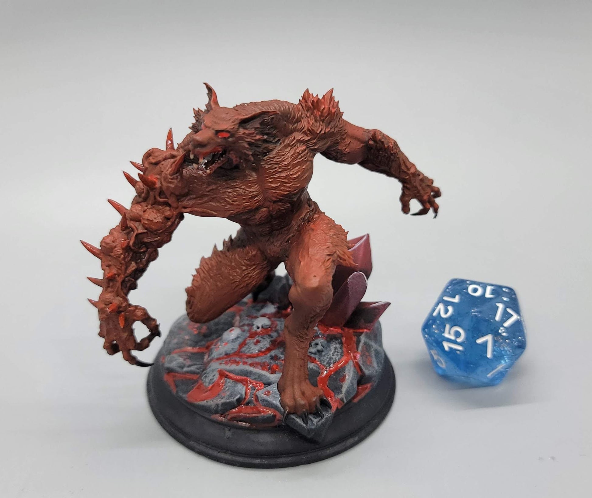 Bloodclaw Abominable Werewolf large sized resin miniature with spiked arm and feral snarl on a rocky base, perfect for TTRPG boss encounters.