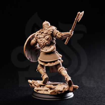 Nils Olav The Heartland Hero resin miniature featuring a Viking warrior with axe and shield, available in 32mm and 75mm scales from D&K Custom Prints.