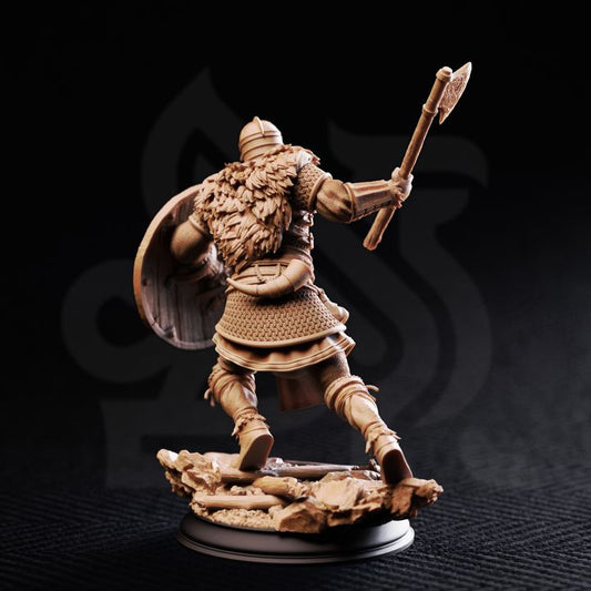 Nils Olav The Heartland Hero resin miniature featuring a Viking warrior with axe and shield, available in 32mm and 75mm scales from D&K Custom Prints.