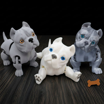 Three dog toys on a dark table