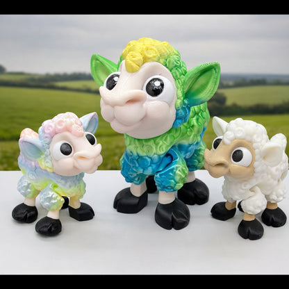 Articulated baby lamb toys in multiple sizes with expressive eyes and detailed wool texture, shown in mixed custom colors including pastel, green, and classic white.
