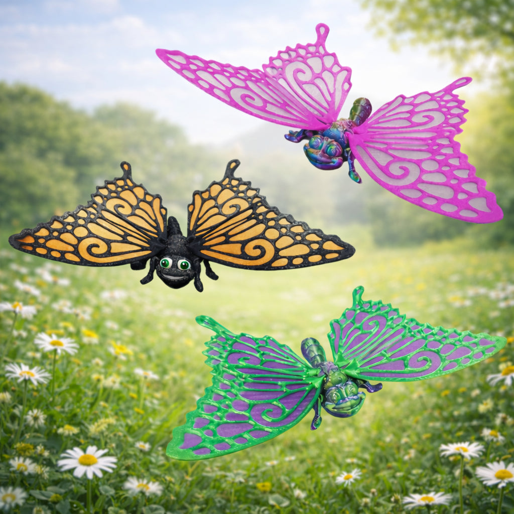 Three colorful 3D printed articulated butterfly toys with movable wings and segmented bodies displayed on a soft pastel background, showing customizable wing colors and detailed design.