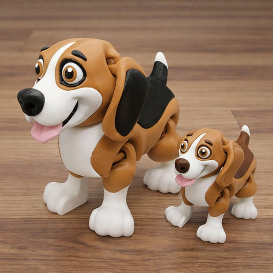 Articulated chibi beagle toy featuring a cute 3D printed dog in brown white and black with oversized eyes rounded proportions and movable joints shown in two sizes on a brown surface for play display or gifts