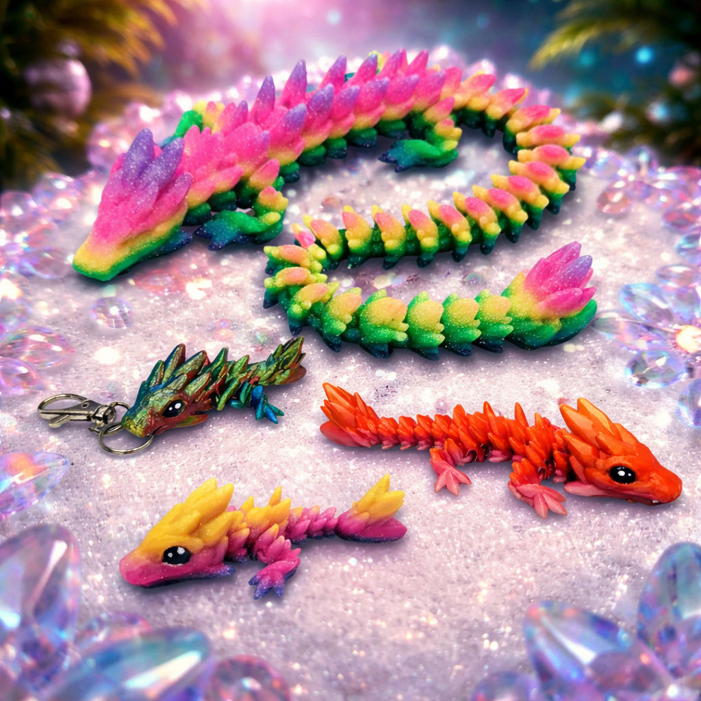 Colorful articulated gemstone dragon toys with crystal scale textures displayed on a bright fantasy style background, flexible dragon figures in multiple sizes and colors.