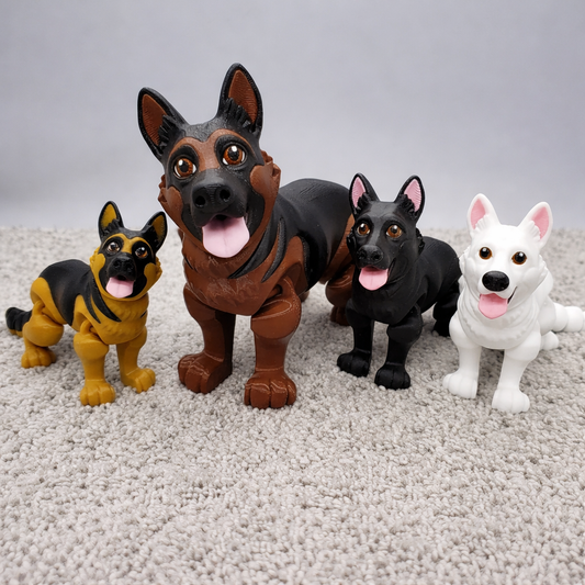 Articulated German Shepherd dog toy shown in black and tan, solid black, and white color variations with expressive faces, collectible dog figure displayed on a soft neutral background