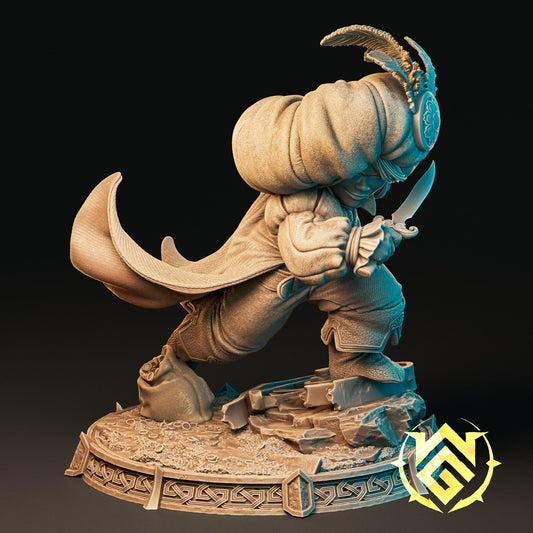 3D printed fantasy miniature of Bicci Shortstride in a dynamic pose, wielding a dagger and wearing a large turban, for D&D and TTRPGs.