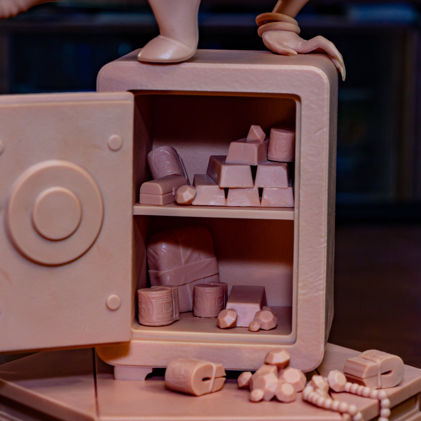 Close-up of 3D printed safe base with gold bars and jewelry for Catwoman statue