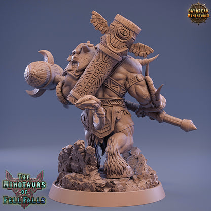 Minotaur figurine with armor and weapon on a blue background, featuring 'Daybreak Miniatures' logo.