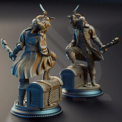 Side angle of pirate scoundrel miniature with saber raised and chest base