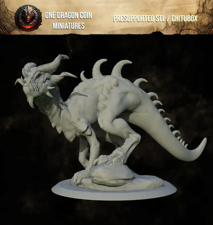 Side view of Earthspike Drake resin miniature on rocky base, perfect for wargaming