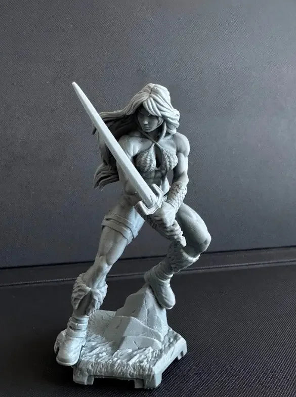 Flare Warrioress raw resin print tabletop example with sword poised