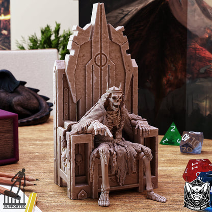 Dungeon Dog Crypt Thing miniature featuring a skeletal king with a crown sitting on a massive stone throne.