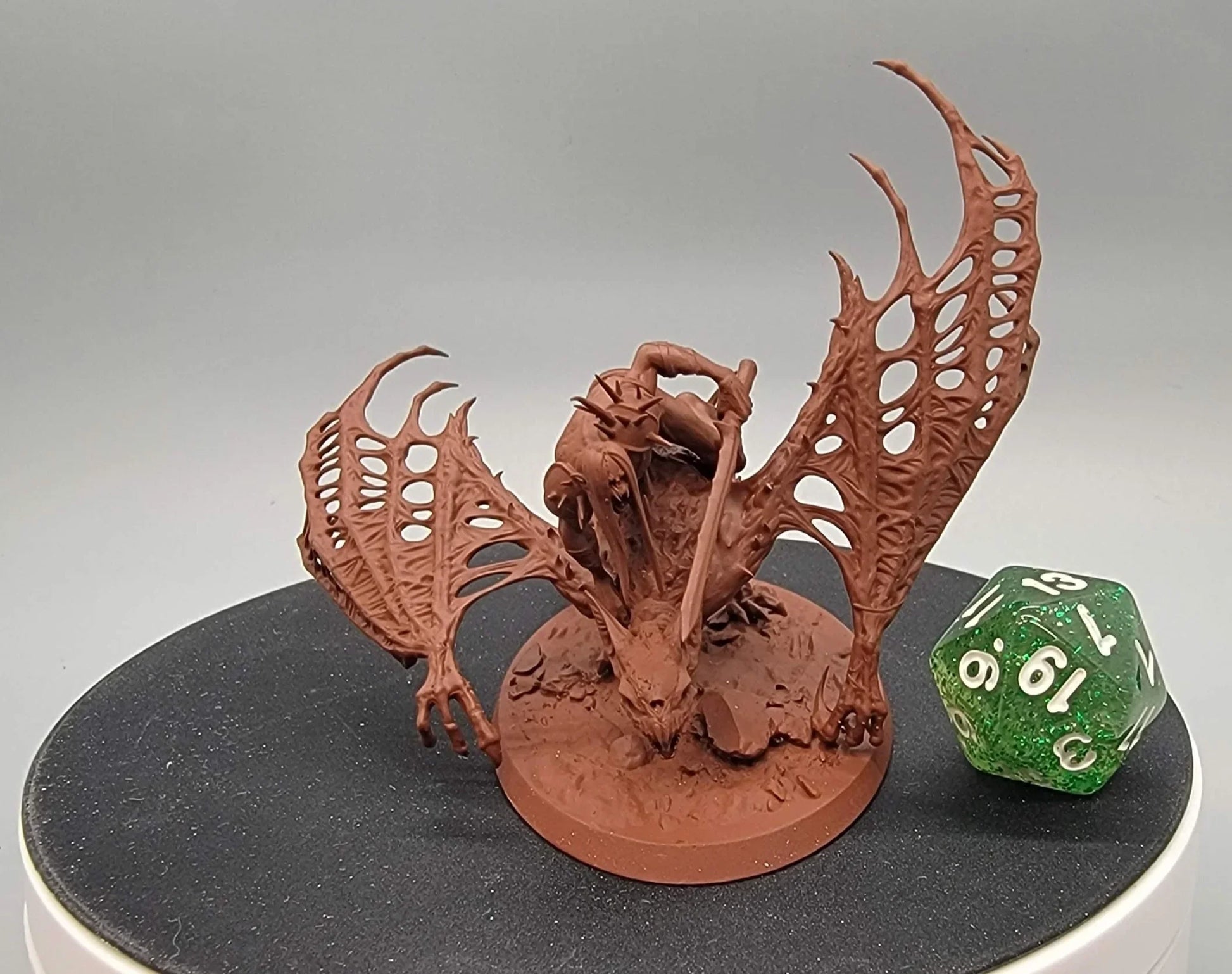 Resin miniature Dabeath Bat Cry with demon rider and winged beast next to d20