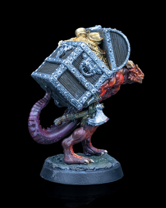 Painted Dragonfolk miniature carrying a treasure chest full of loot