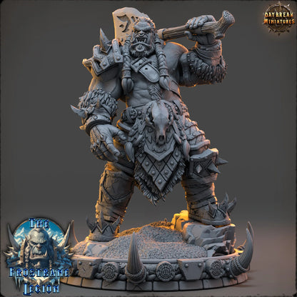 Massive frost orc warlord miniature with skull armor and spiked axe, standing on a custom scenic base—ideal for tabletop boss fights or barbarian army leaders.