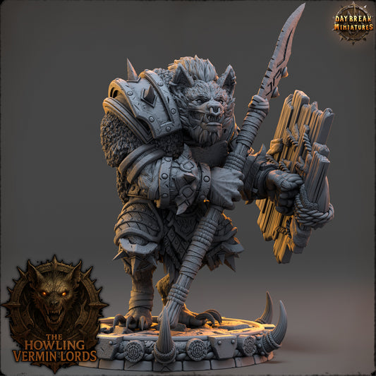 Front view of Drozhk Bloodhowl, a heavily armored wolf-like warrior by Daybreak Miniatures holding a spear and makeshift shield.