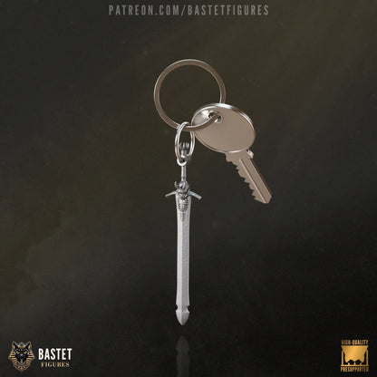 Close-up of sword keychain next to house key – 76mm long
