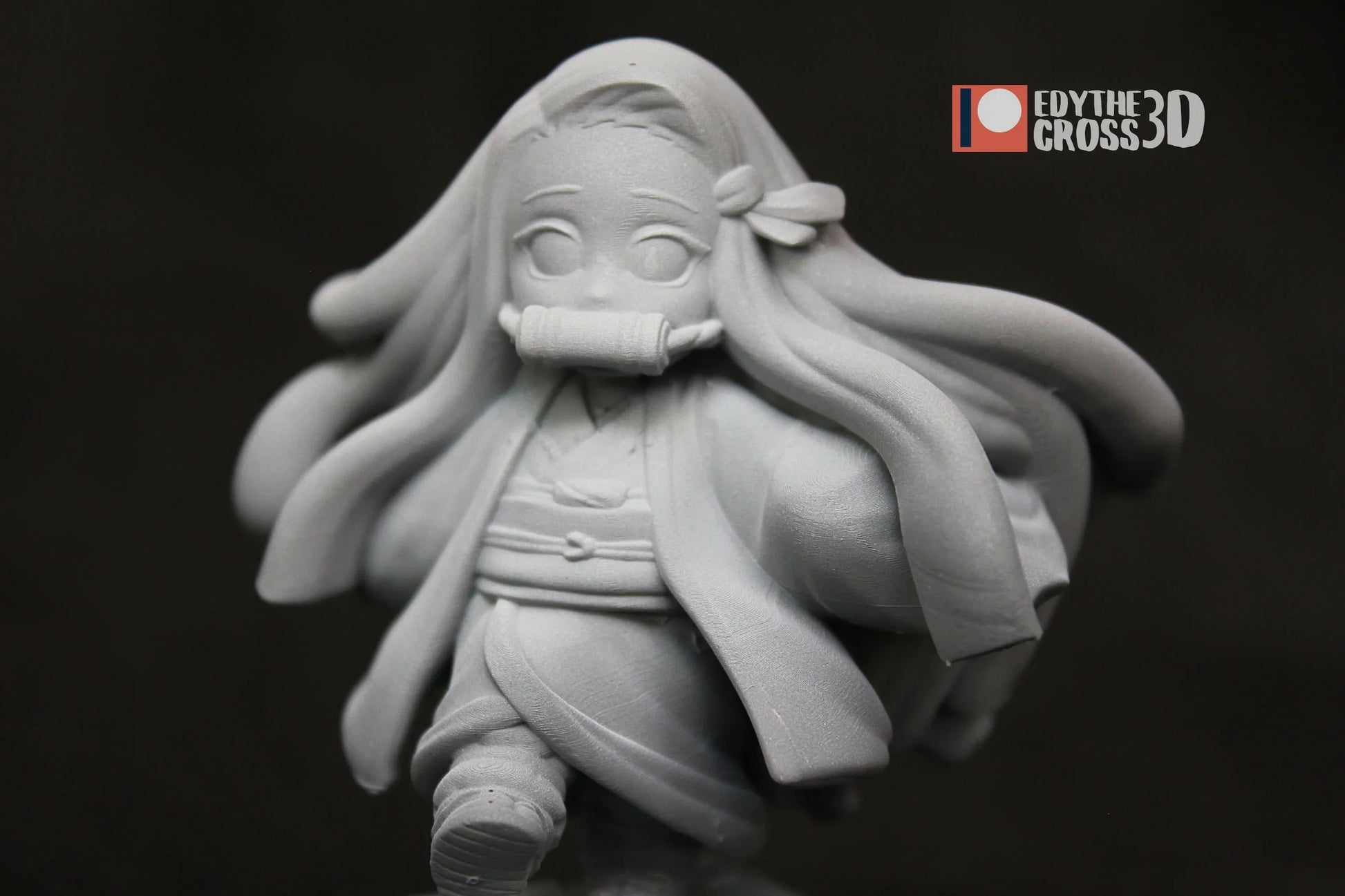Side view of Nezuko Kamado resin figure with flowing hair and kimono, unpainted 3D print