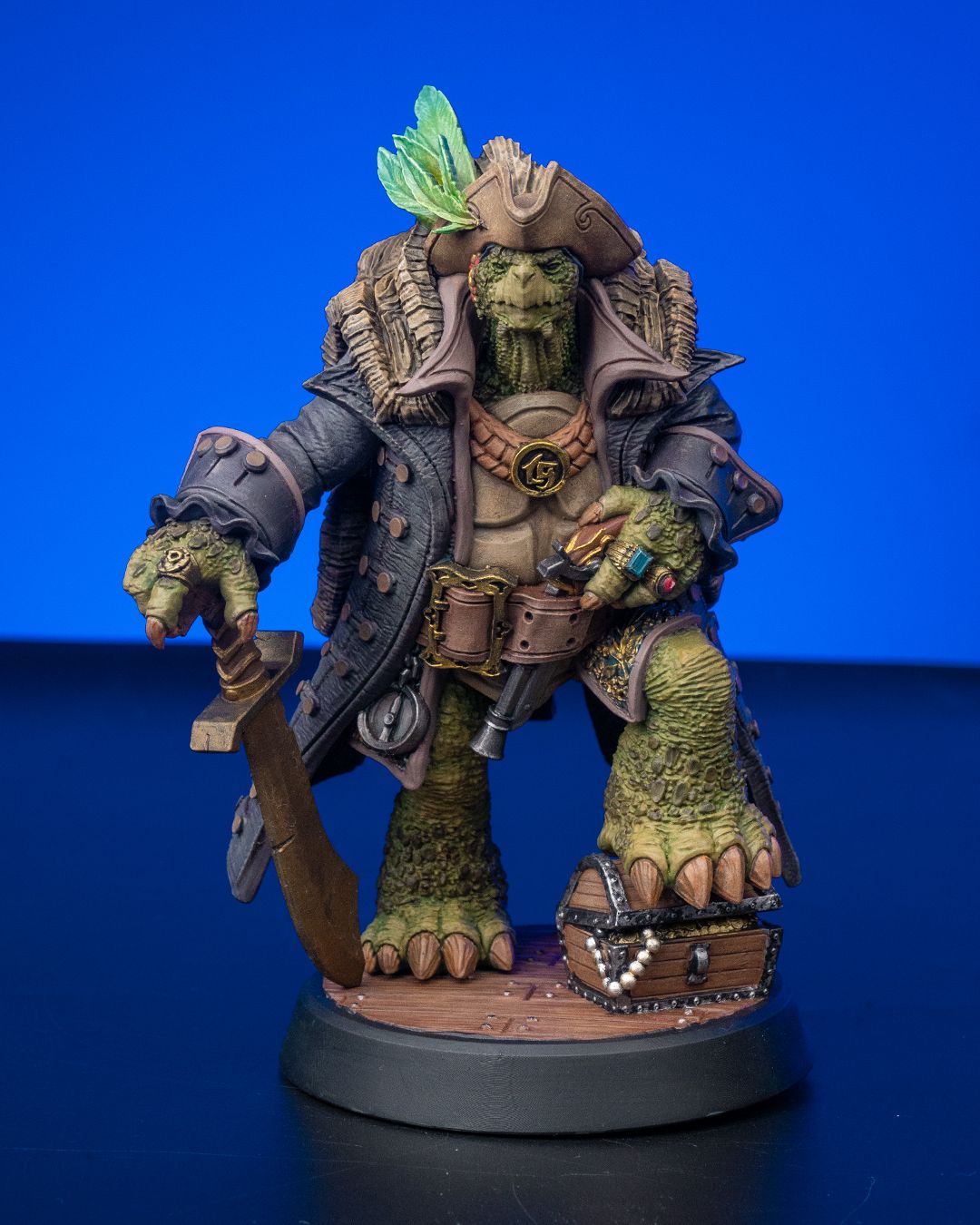 Krog resin pirate captain miniature figure for D&D and TTRPGs, shown in raw resin and painted versions, with sword and treasure chest base.