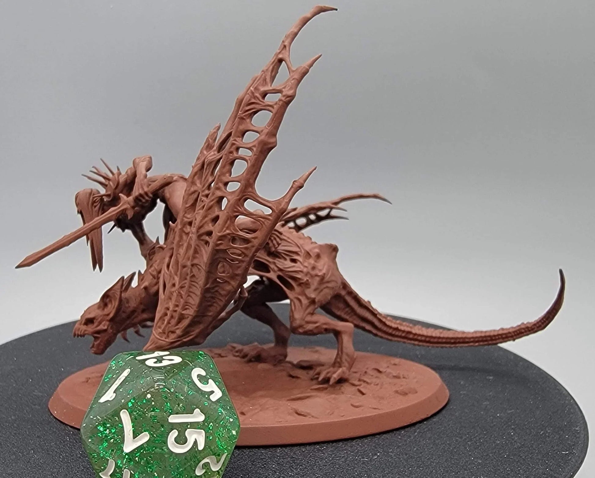 Side view of Dabeath Bat Check resin miniature with wings and sword