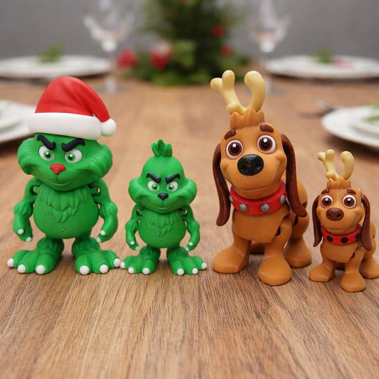 Little green guy and reindeer dog chibi figures with cute expressions, festive fantasy holiday collectibles