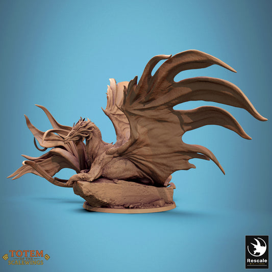 Side view of standing brass dragon with flowing horns and tail