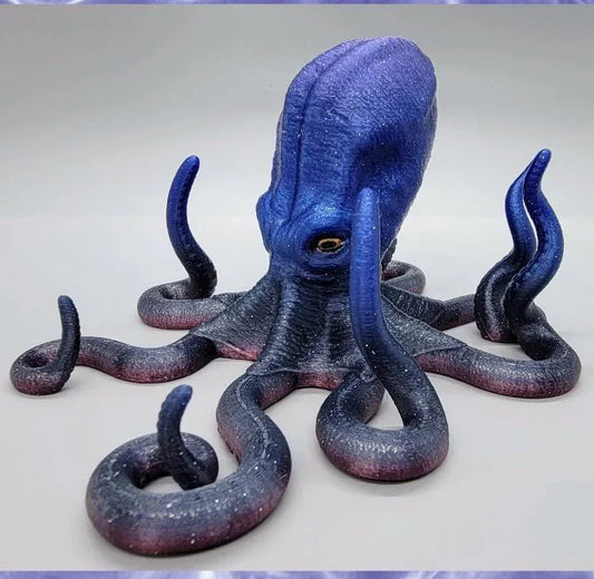 Blue octopus phone holder on a grey background