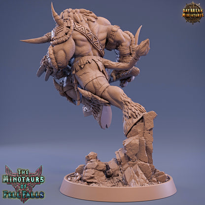 Minotaur figurine on a rocky base with 'Daybreak Miniatures' branding.
