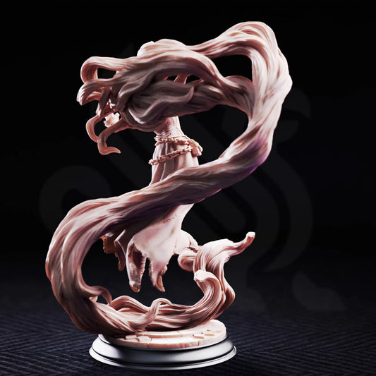 Rear view resin mini of Rapunzel the Mad showing large flowing hair tendrils anchored to base.