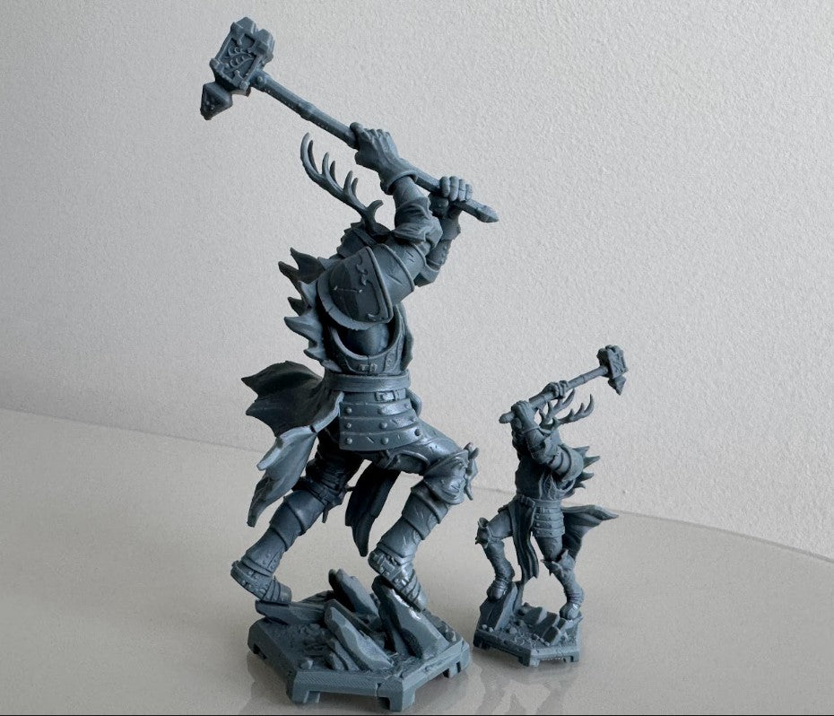 Both scales shown in comparison side profiles of Royal Crusher resin miniature in heavy plate armor with stag horn crest and warhammer.