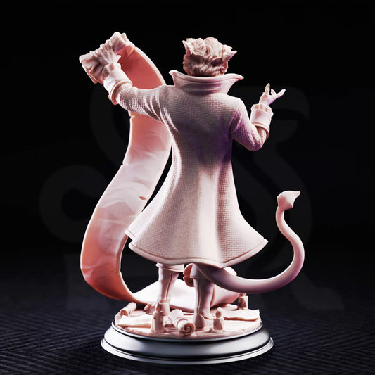 Rear view resin mini of Rumpelstiltskin showing long tail, coat back, and scroll base.