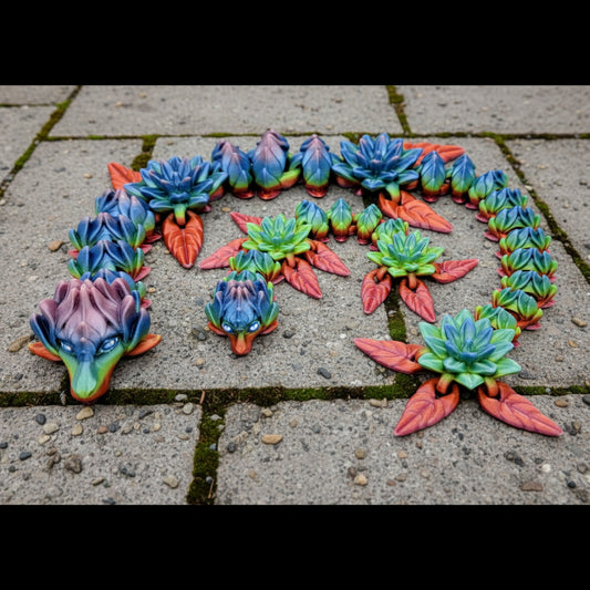Articulated lotus dragon toy in teal blue, turquoise, green, purple, and coral red, featuring flower like scales, leaf fins, and a flexible segmented body for posing and fidget play.