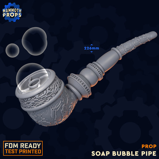 3D-printed Soap Bubble Pipe prop by Mammoth Props, featuring intricate floral and filigree carvings on a grey textured surface. The pipe measures 226mm in length and is shown with floating soap bubbles emerging from the bowl. The image includes text "FDM Ready" and "Test Printed."